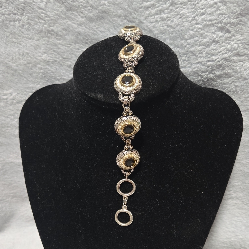 Elegant Gold and Silver Bracelet